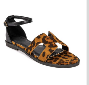 Edmond Leopard Print H-Strap Flat Sandals – product shot showing leopard print pony hair H-strap upper with black leather ankle strap and gold buckle