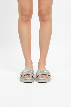 High-Key White Studio — Crystal Slide, Standing