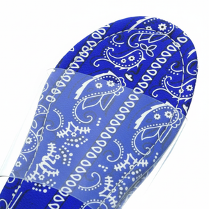 Sierra Blue Bandana Paisley Print Clear Strap Flat Slide Sandals – macro close-up of royal blue and white bandana paisley print footbed detail
