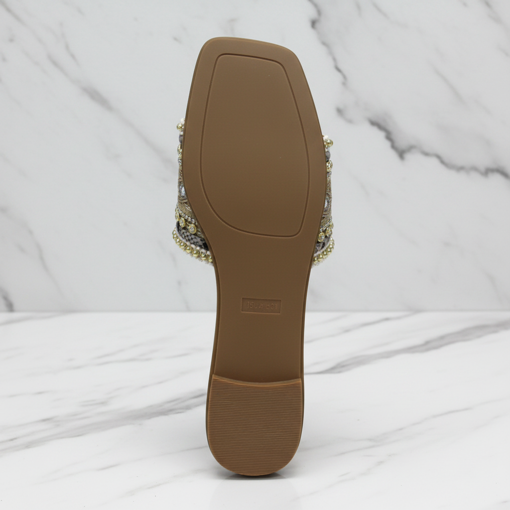 Zuri Nude Gold Embroidered Crystal Flat Slide Sandals – sole bottom view