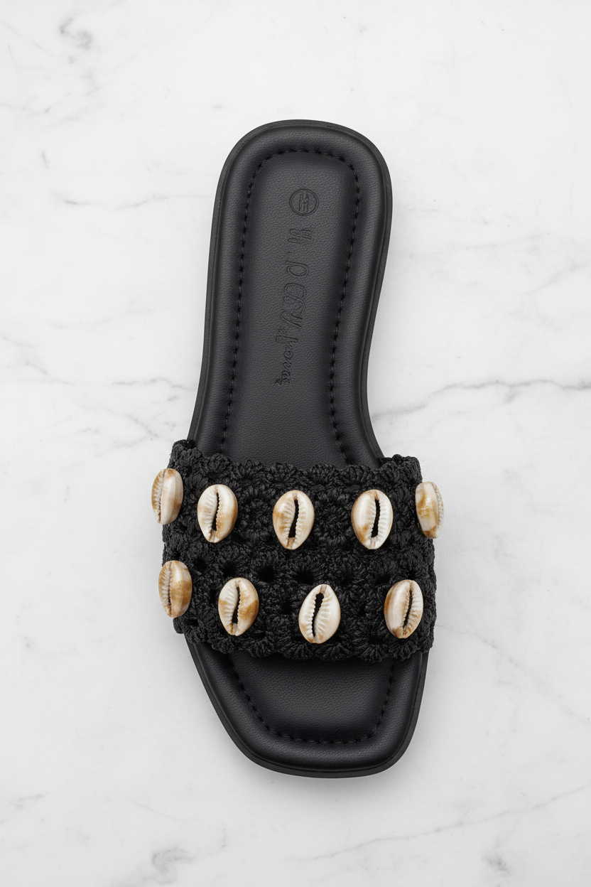 Evani Black Cowrie Shell Raffia Flat Slide Sandals – top-down overhead view showing full sandal