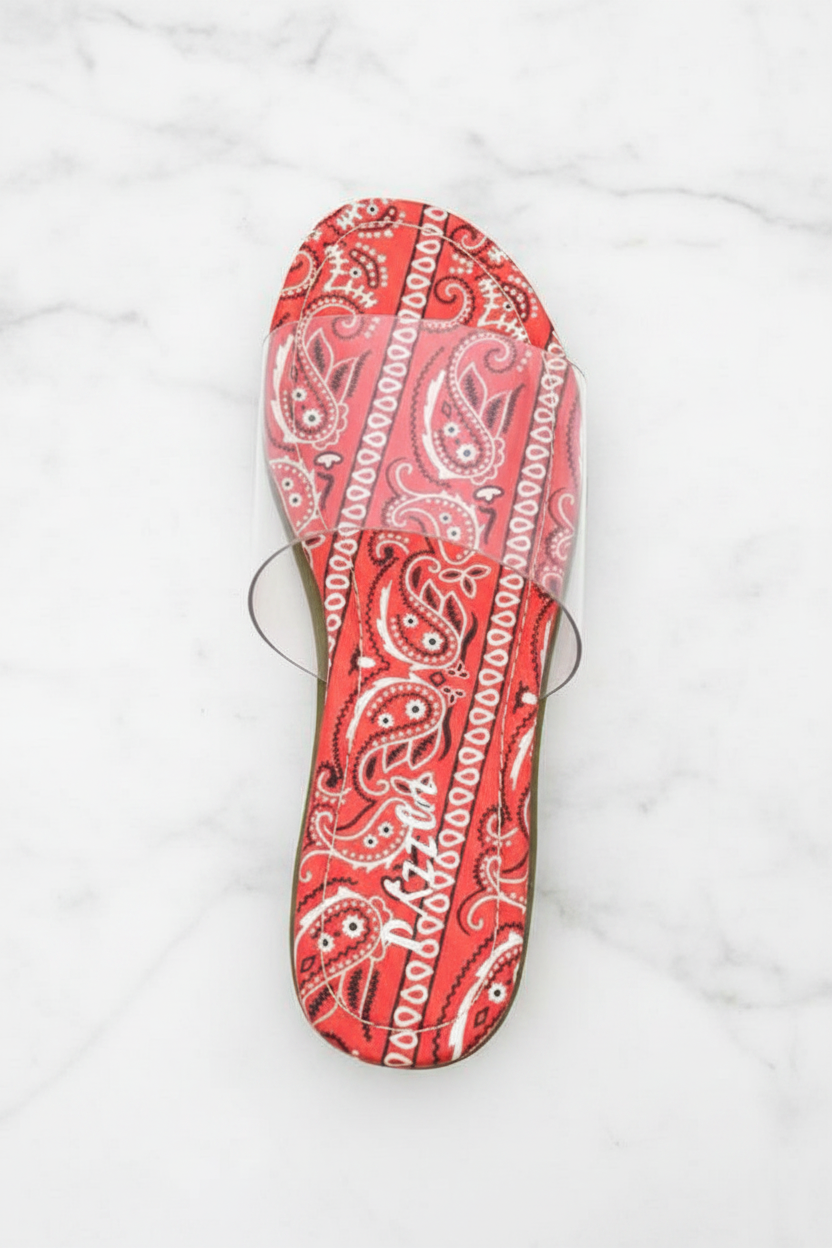 Sierra Red Bandana Paisley Print Clear Strap Flat Slide Sandals – top-down overhead view showing full sandal on white marble