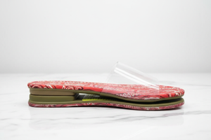 Sierra Red Bandana Paisley Print Clear Strap Flat Slide Sandals – side profile view on white marble