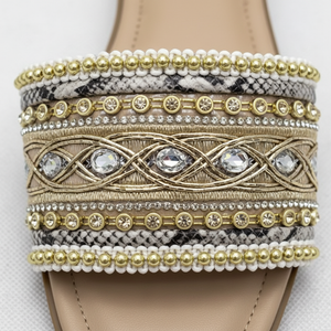 Zuri Nude Gold Embroidered Crystal Flat Slide Sandals – macro close-up of gold metallic embroidery, crystal mirror jewels and gold bead rows