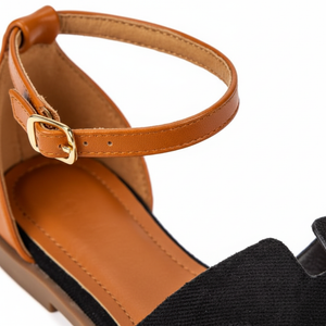 Edmond Black Suede H-Strap Flat Sandals – macro close-up of gold buckle and tan leather ankle strap detail