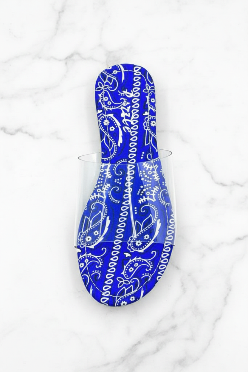 Sierra Blue Bandana Paisley Print Clear Strap Flat Slide Sandals – top-down overhead view showing full sandal on white marble
