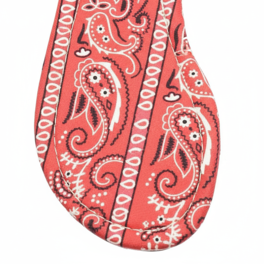 Sierra Red Bandana Paisley Print Clear Strap Flat Slide Sandals – macro close-up of red and pink bandana paisley print footbed detail